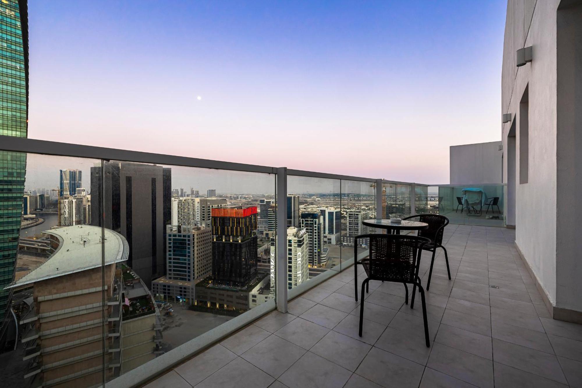 Апартаменти Unlock Metropolis Business Bay Дубай Номер фото