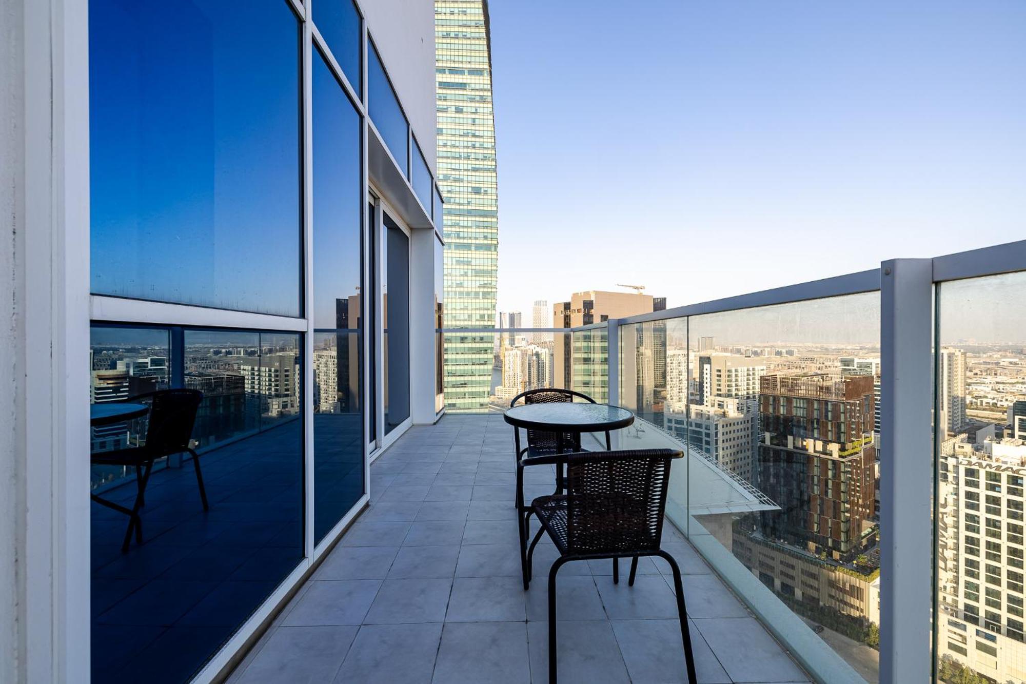 Апартаменти Unlock Metropolis Business Bay Дубай Номер фото